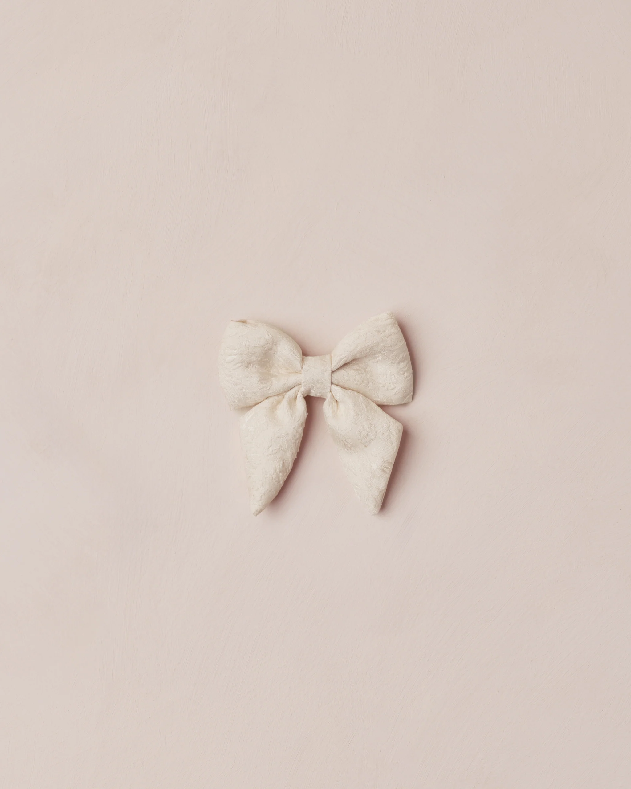 Ivory Norah Bow